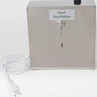 Desinfektionsmittel- oder Seifenspender in Edelstahl mit 230 V Anschluss mit Infrarotauslösung - berührungslos